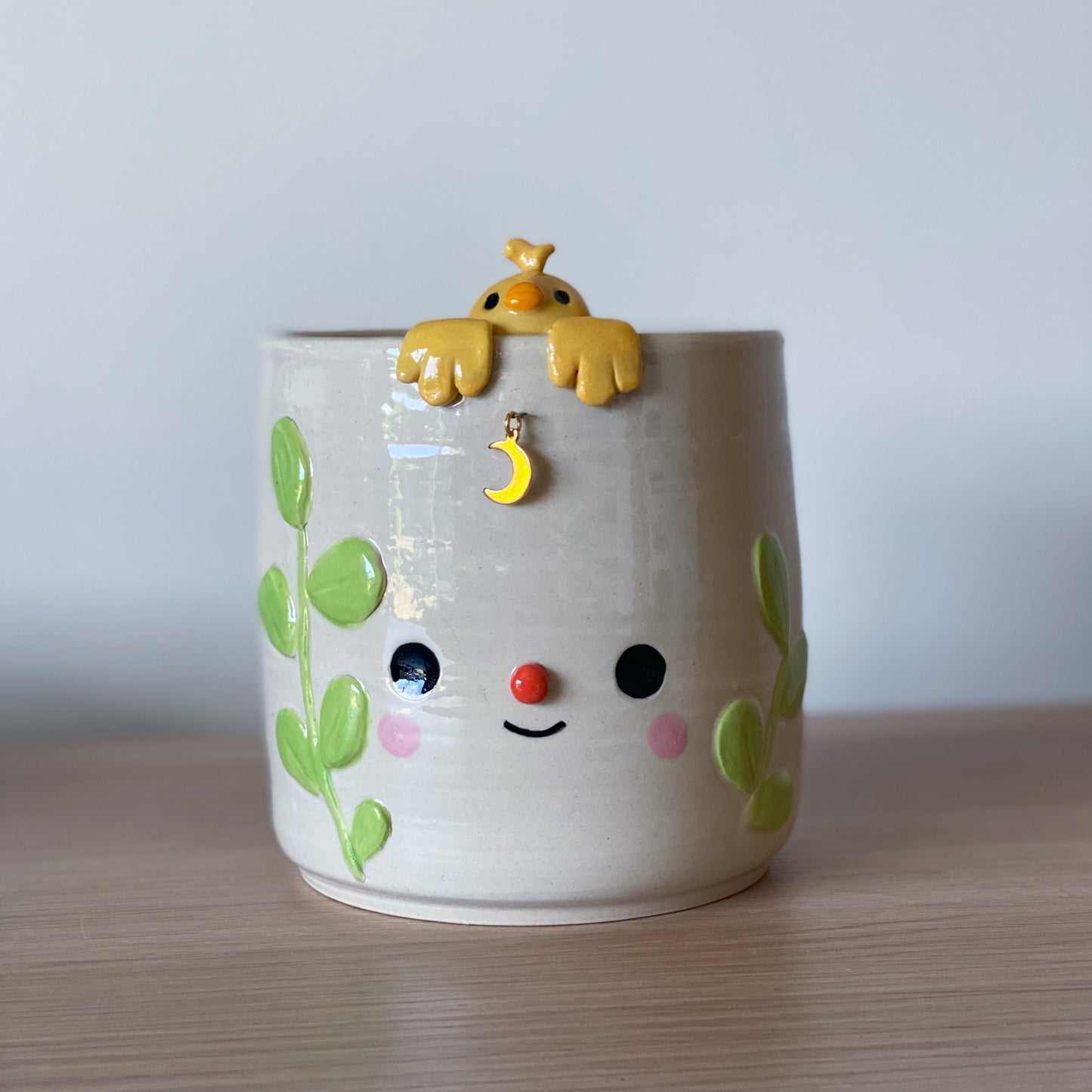 Canari suspendu - Pot de fleur